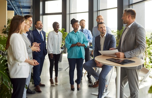 diverse group of business people talking at a trade show