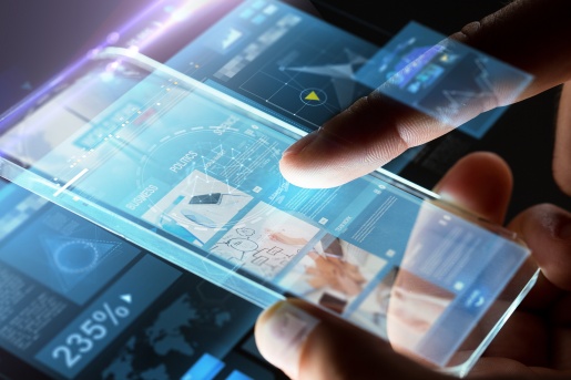finger hovering over smart phone with news window displayed and hologrammed